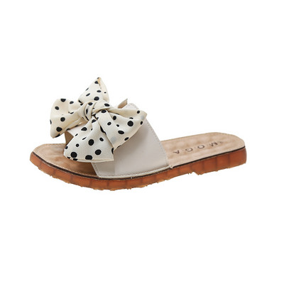 Naiste vabaaja sussid täpilise paelaga