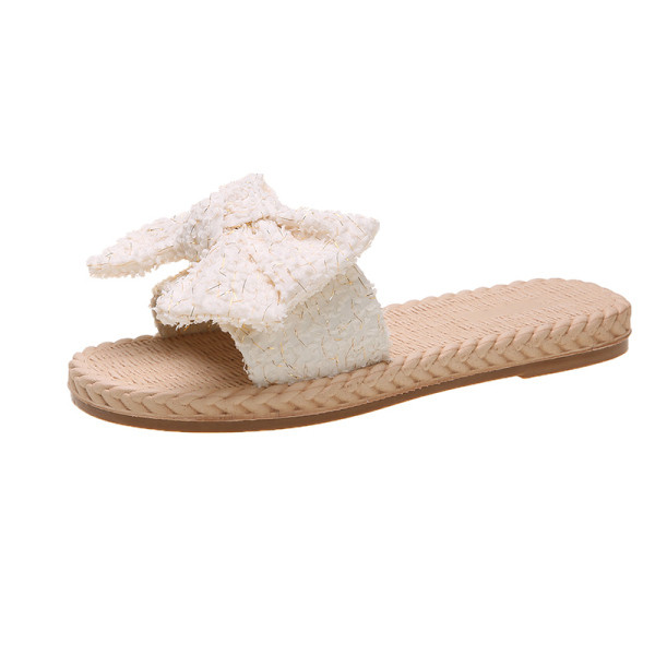 Papuci de damă cu talpă plată și element panglică