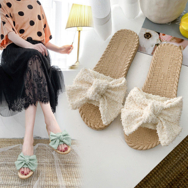 Papuci de damă cu talpă plată și element panglică