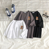 Tricou de dama modern model larg cu maneca scurta si aplicatie