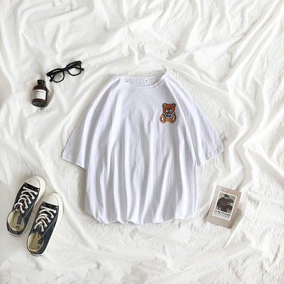 Tricou de dama modern model larg cu maneca scurta si aplicatie
