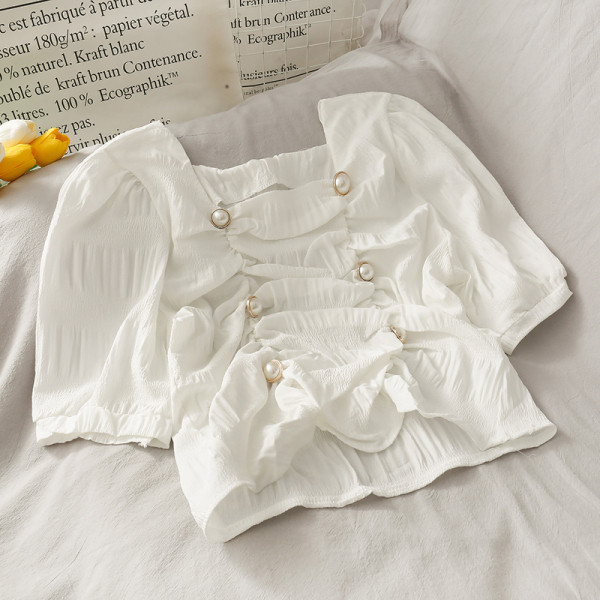 Modern női blúz gyöngyökkel és négyzet alakú nyakkivágással