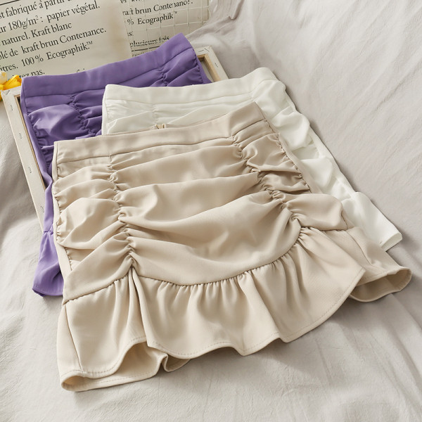 Pieguloši sieviešu svārki ar lokām un augstu vidukli