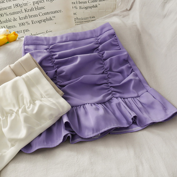 Pieguloši sieviešu svārki ar lokām un augstu vidukli