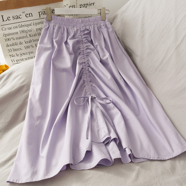 Naiste pikk asümmeetriline kõrge vöökoha ja lipsudega seelik