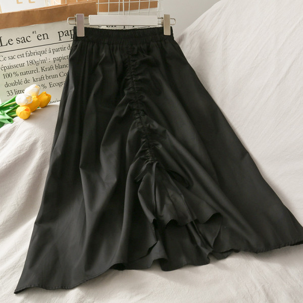 Naiste pikk asümmeetriline kõrge vöökoha ja lipsudega seelik