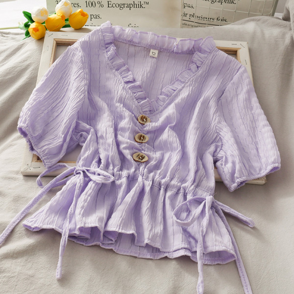 Moodne naiste põsk nööpide ja lipsudega