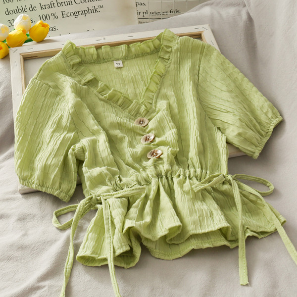 Moodne naiste põsk nööpide ja lipsudega