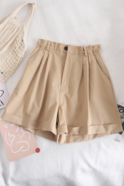 Sieviešu šorti ar elastīgu jostasvietu un pogu