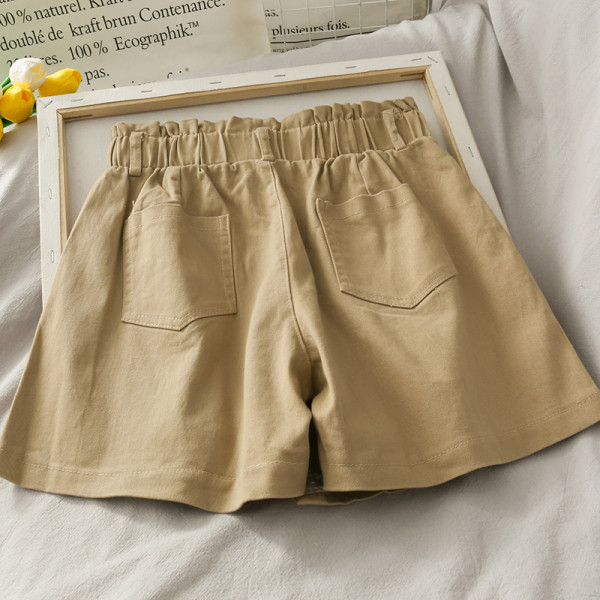 Pantaloni scurti asimetrici de dama cu talie inalta si nasturi