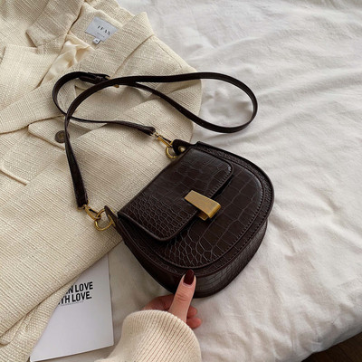 Geanta de dama din piele ecologica de ultima generatie in forma rotunda