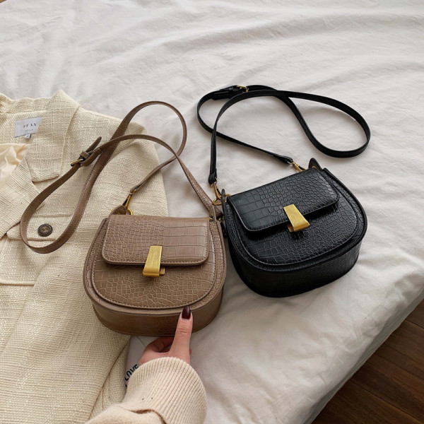 Geanta de dama din piele ecologica de ultima generatie in forma rotunda