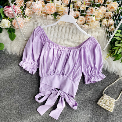 Bluză de damă modernă cu mâneci căzute și cravate