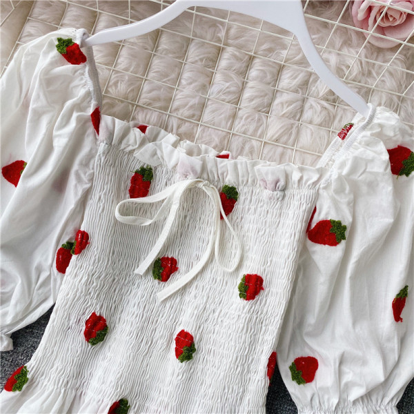 Naiste allatõmmatud varrukatega pluus