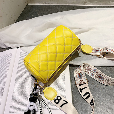 Ümmarguse kuju ja laia sangaga naiste kaasaegne ökonahast kott