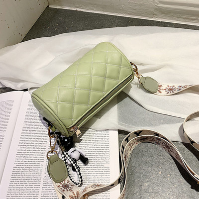 Ümmarguse kuju ja laia sangaga naiste kaasaegne ökonahast kott