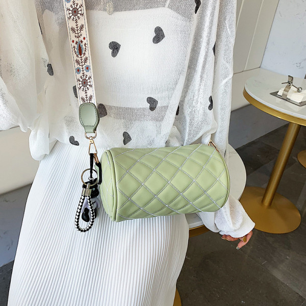 Ümmarguse kuju ja laia sangaga naiste kaasaegne ökonahast kott