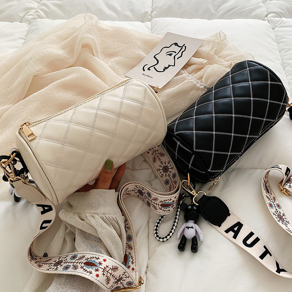 Ümmarguse kuju ja laia sangaga naiste kaasaegne ökonahast kott