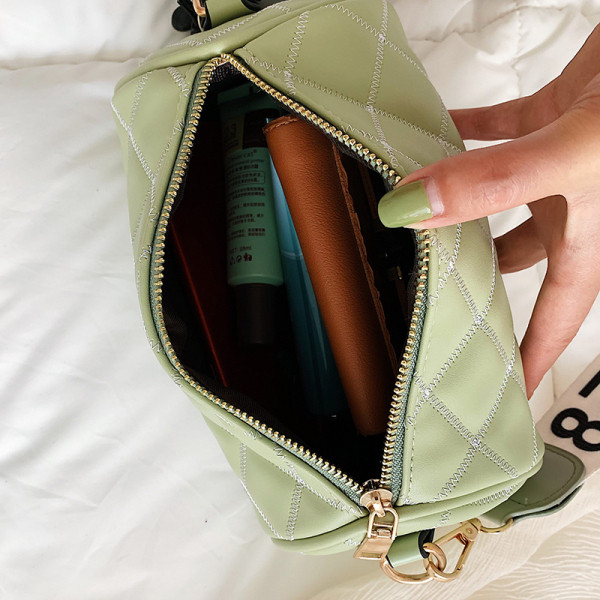 Ümmarguse kuju ja laia sangaga naiste kaasaegne ökonahast kott