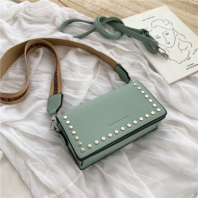 Mini geanta de dama moderna cu ochiuri si maner lat