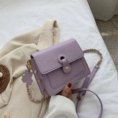 Mūsdienīga sieviešu soma ar garu rokturi un cilpām