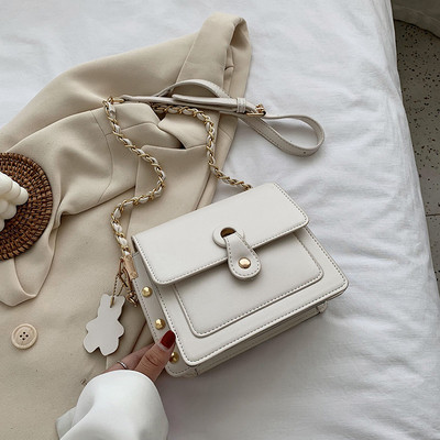 Mūsdienīga sieviešu soma ar garu rokturi un cilpām