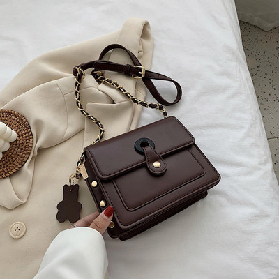 Mūsdienīga sieviešu soma ar garu rokturi un cilpām