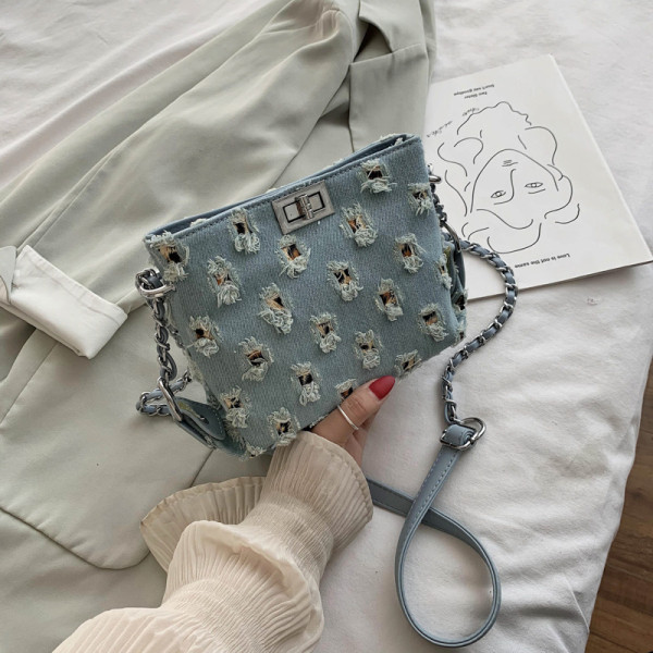 Naiste kaasaegne pika sangaga teksakott