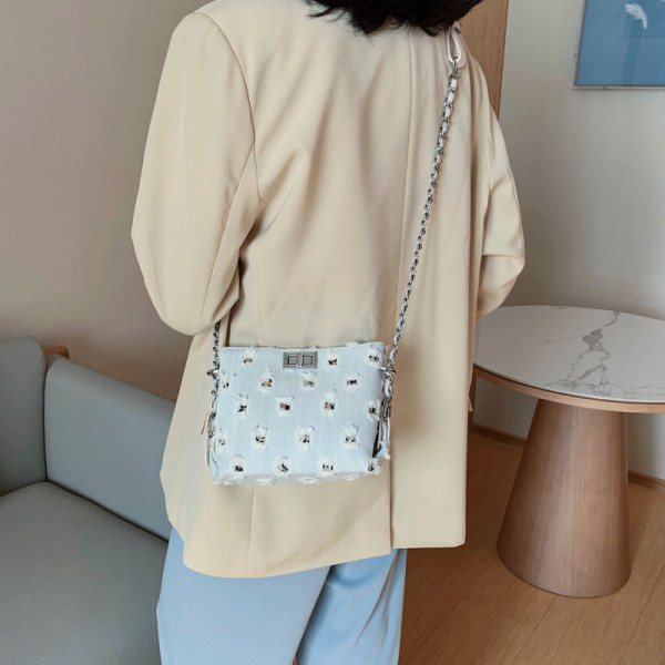 Naiste kaasaegne pika sangaga teksakott