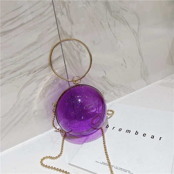 Naiste moodne ümmargune pika metallist käepidemega kott