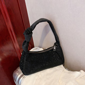 Moodne tõmbluku ja aasadega naiste kott