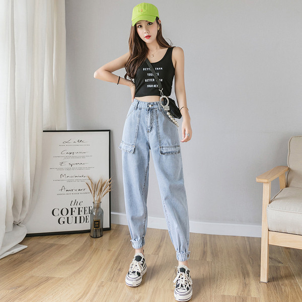 Moodsad kõrge vöökohaga naiste teksad – lai mudel