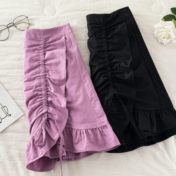 Praegune kõrge vöökoha ja lipsudega naiste seelik