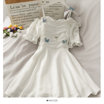 Balta sieviešu kleita ar aplikācijām