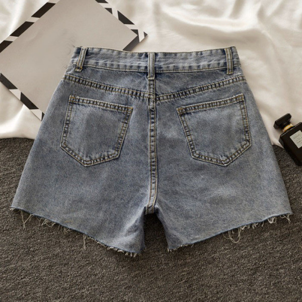 Къси дамски дънкови панталони със скъсани мотиви и регулираща се талия 