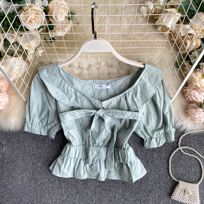 Moodne naiste lühikeste varrukate ja paelaga pluus