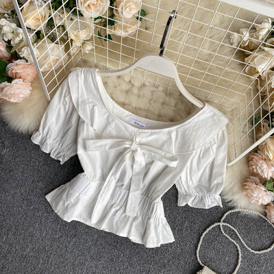 Moodne naiste lühikeste varrukate ja paelaga pluus