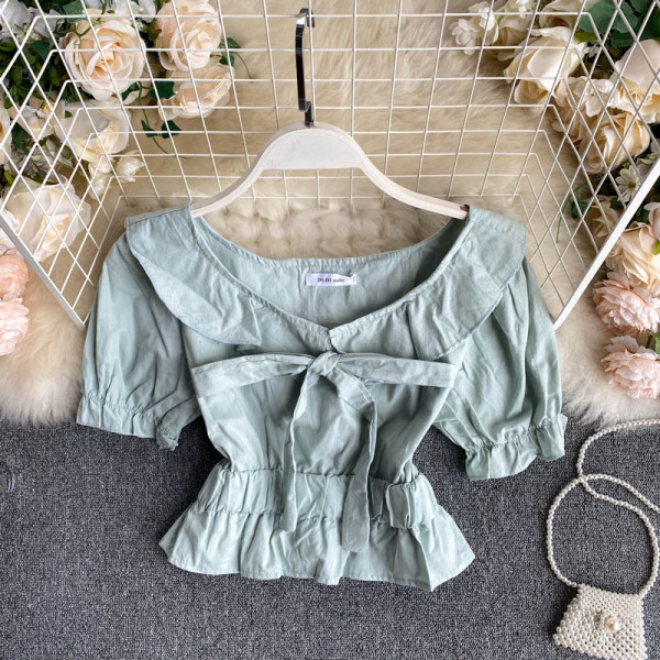 Moodne naiste lühikeste varrukate ja paelaga pluus