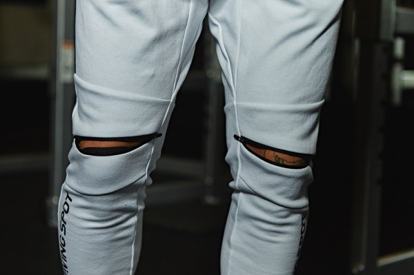 Αθλητικά και casual ανδρικά παντελόνια με επιγραφή και φερμουάρ