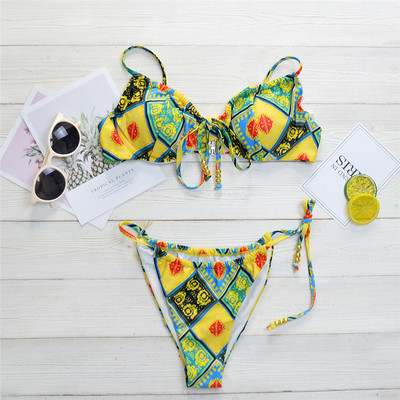 Värviline kaheosaline õhukeste rihmade ja lipsudega ujumistrikoo