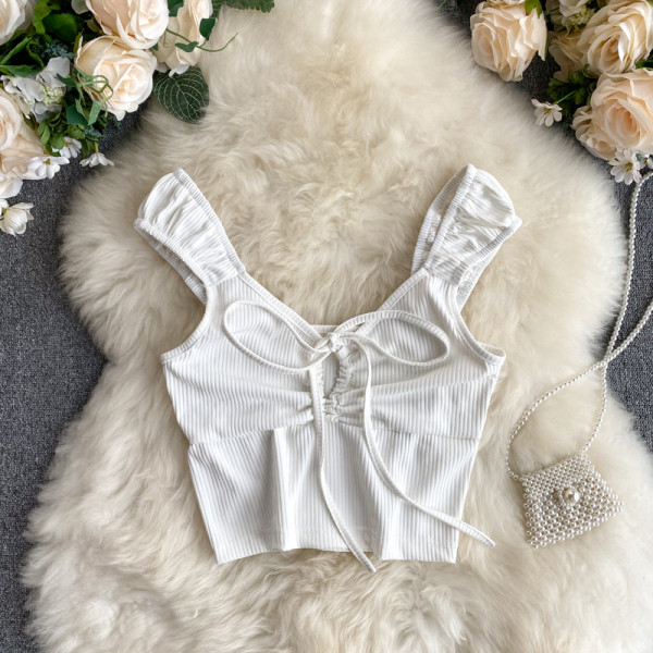 Moodne velvetist trikoo ja lipsudega naiste topp