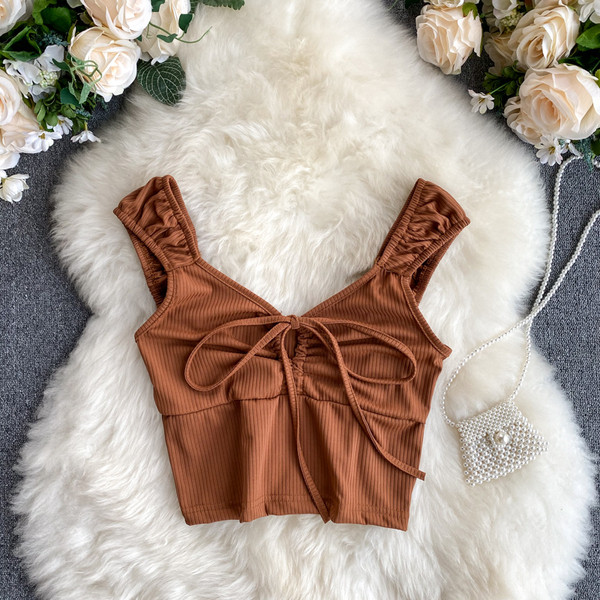 Moodne velvetist trikoo ja lipsudega naiste topp