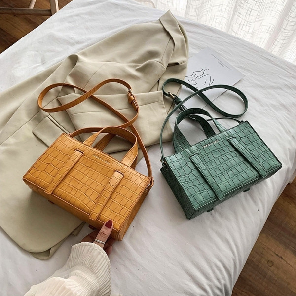 Γυναικεία κομψή οικολογική δερμάτινη τσάντα με μεγάλες και κοντές λαβές