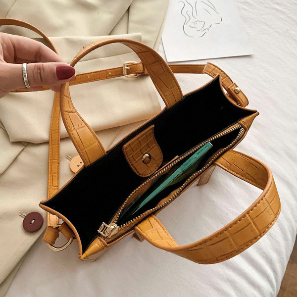 Γυναικεία κομψή οικολογική δερμάτινη τσάντα με μεγάλες και κοντές λαβές