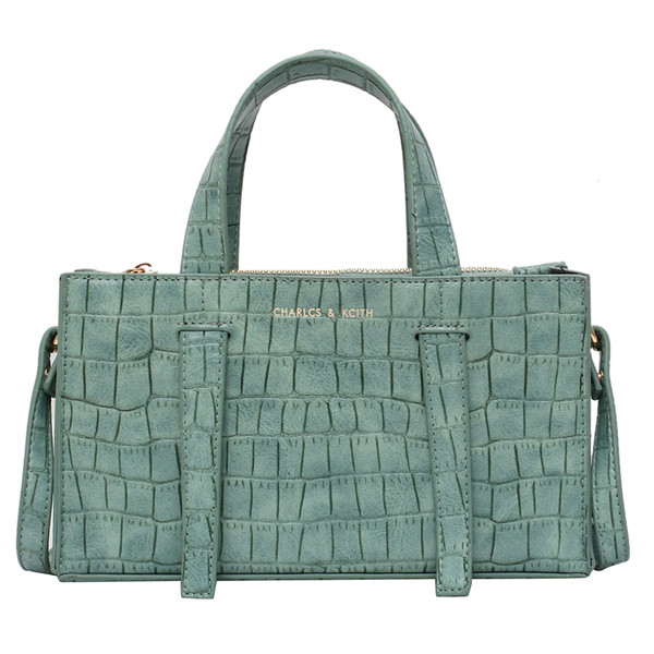 Γυναικεία κομψή οικολογική δερμάτινη τσάντα με μεγάλες και κοντές λαβές