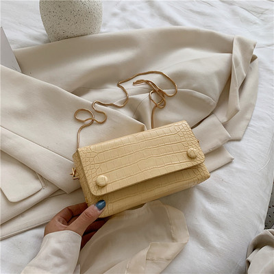 Τρέχουσα γυναικεία τσάντα απλό μοντέλο με λεπτή λαβή