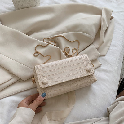 Τρέχουσα γυναικεία τσάντα απλό μοντέλο με λεπτή λαβή