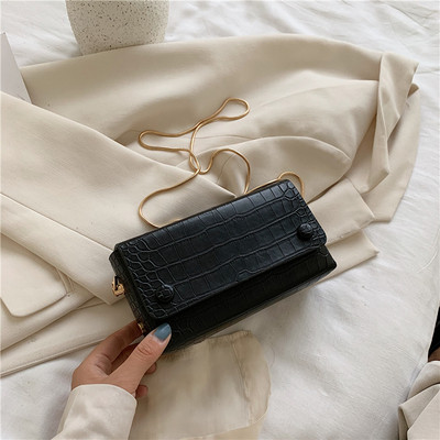 Τρέχουσα γυναικεία τσάντα απλό μοντέλο με λεπτή λαβή