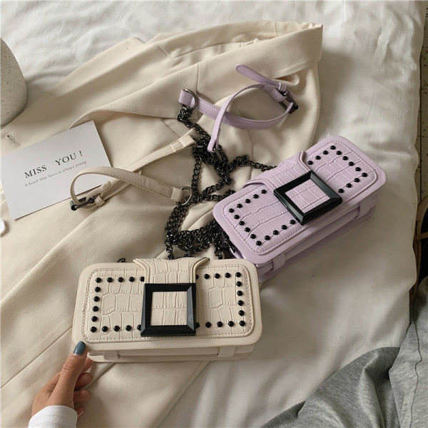 Geanta de dama moderna din piele ecologica cu ochiuri si catarama