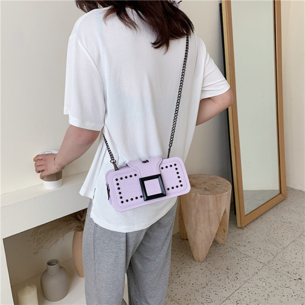 Geanta de dama moderna din piele ecologica cu ochiuri si catarama